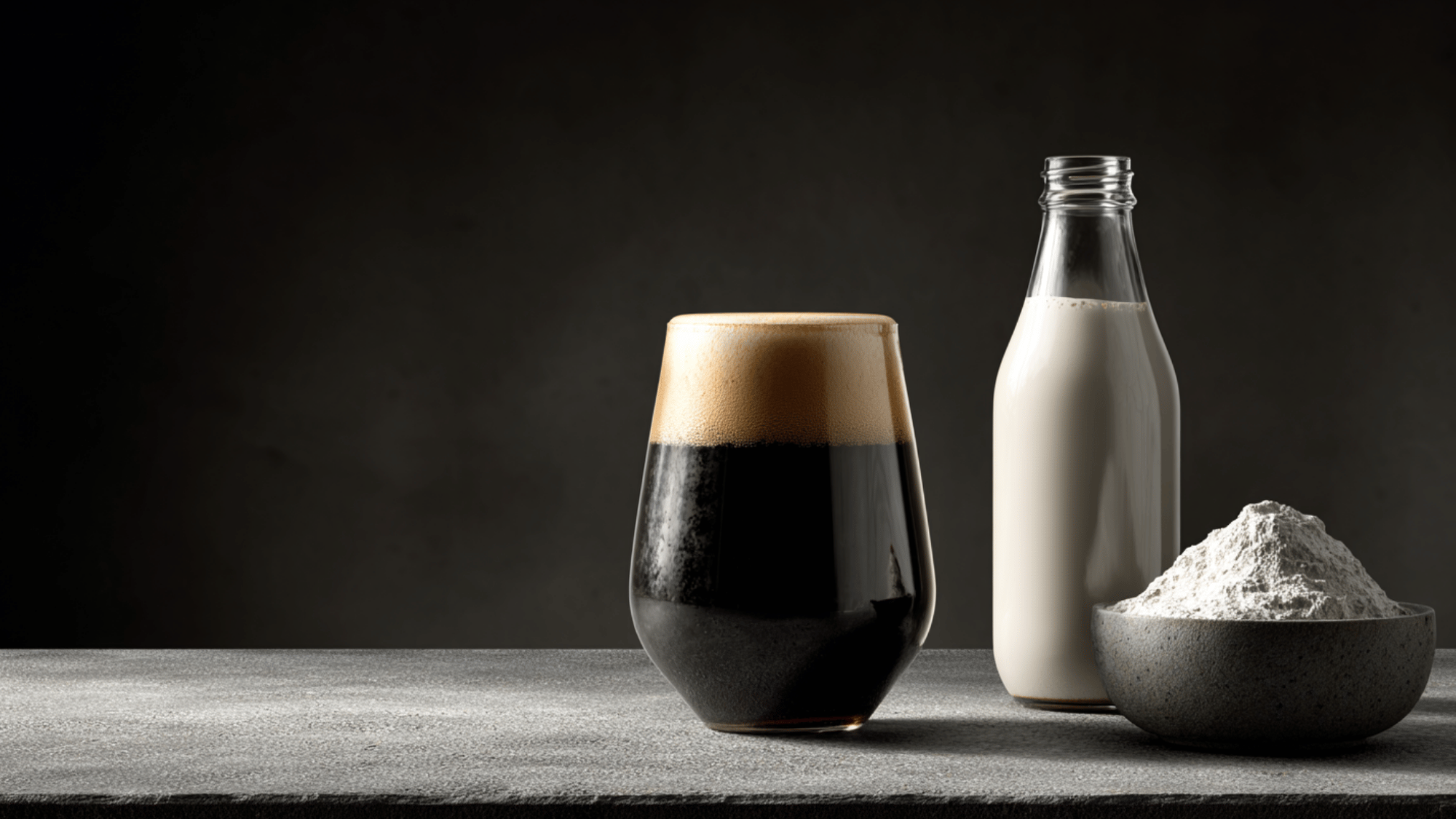 A freshly poured pint of traditional British cask ale in a classic nonic glass. The bright amber beer features a rich, creamy head, set against a cozy, dimly lit pub background.