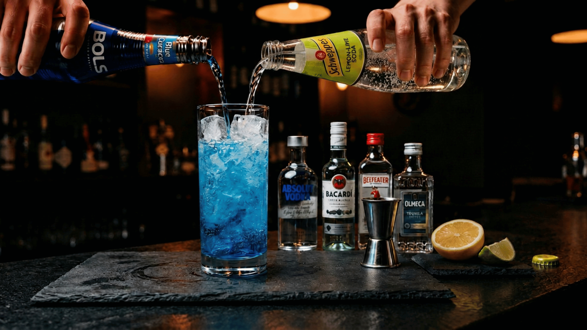 Blue curaçao and lemon-lime soda poured into an iced highball cocktail.