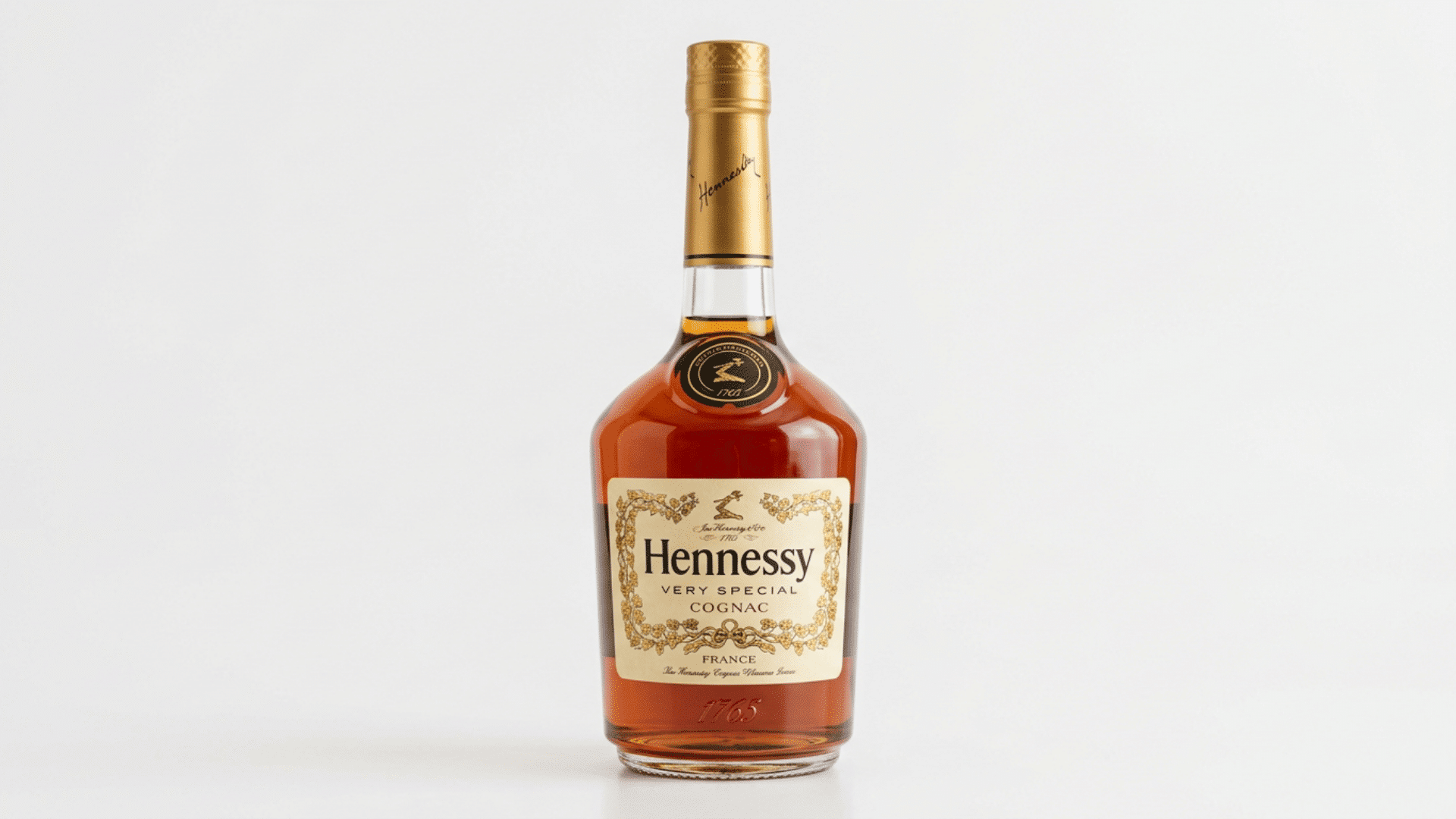 hennessy v.s cognac bottle on a plain background