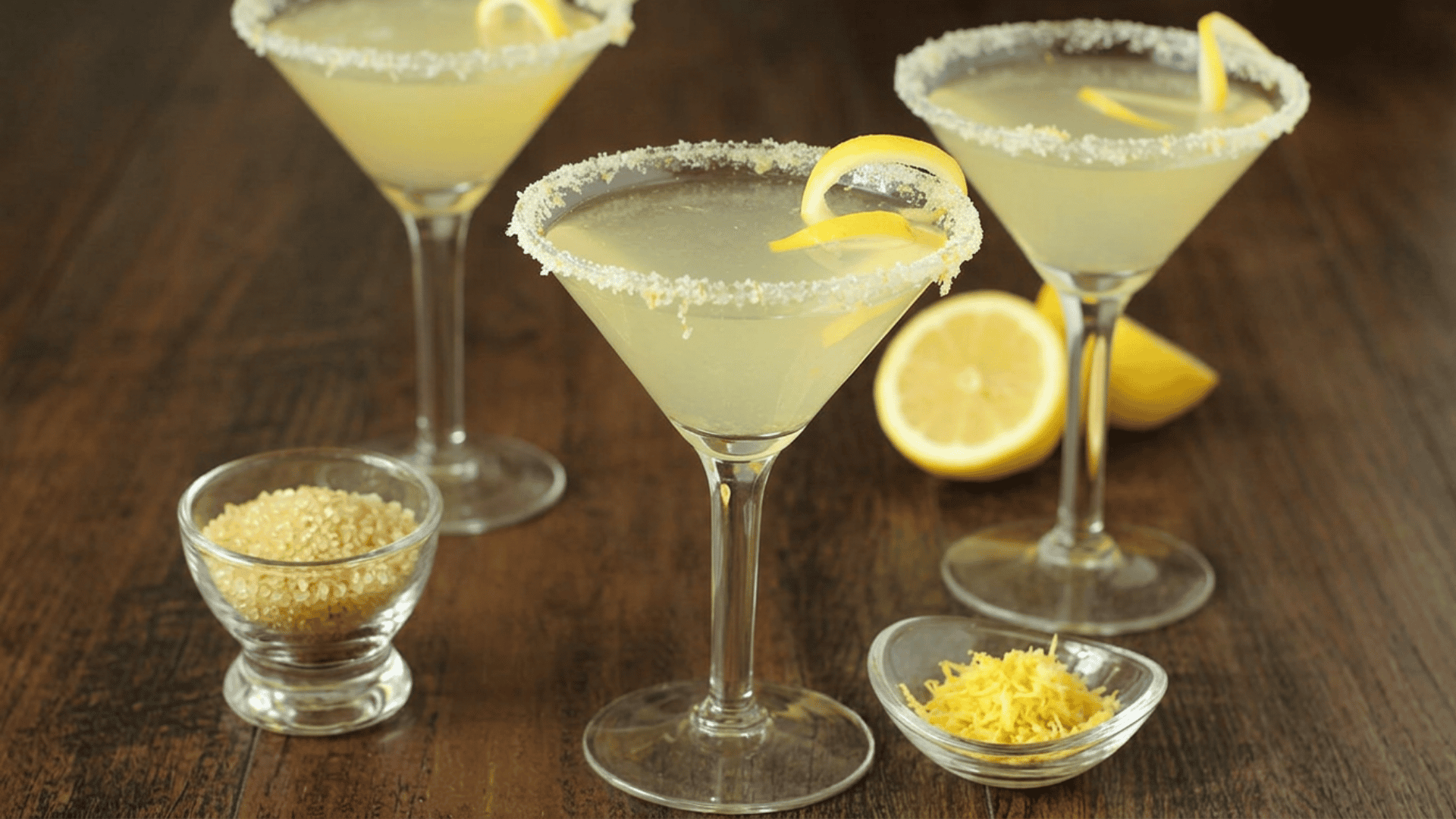 Lemon Drop Martini with sugar rim and lemon twist garnish.