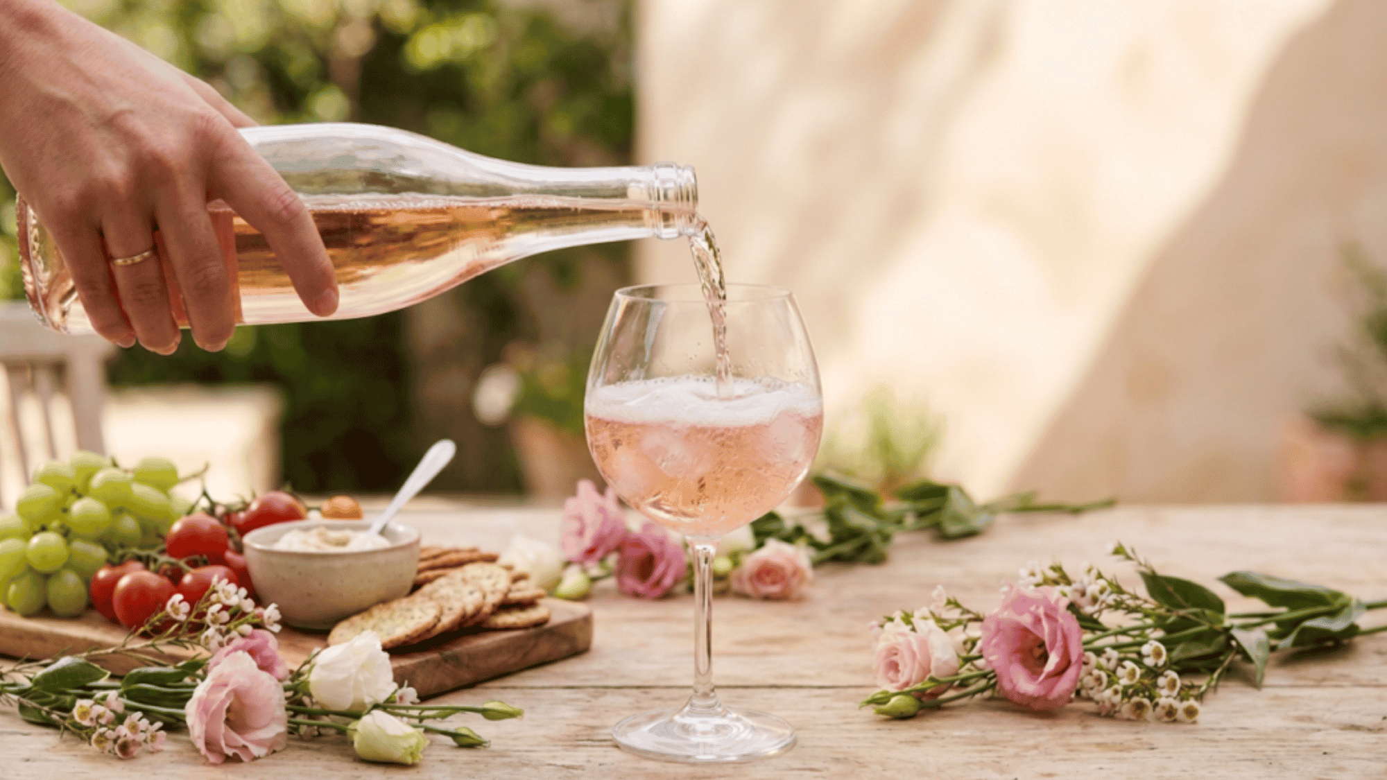 A glass of pale blush rosé wine highlighting its crisp, refreshing color.
