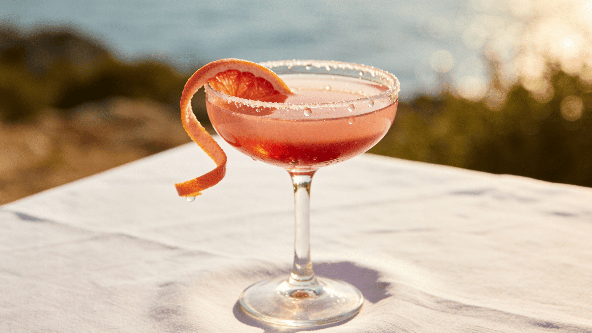 Siesta cocktail with grapefruit twist and blush