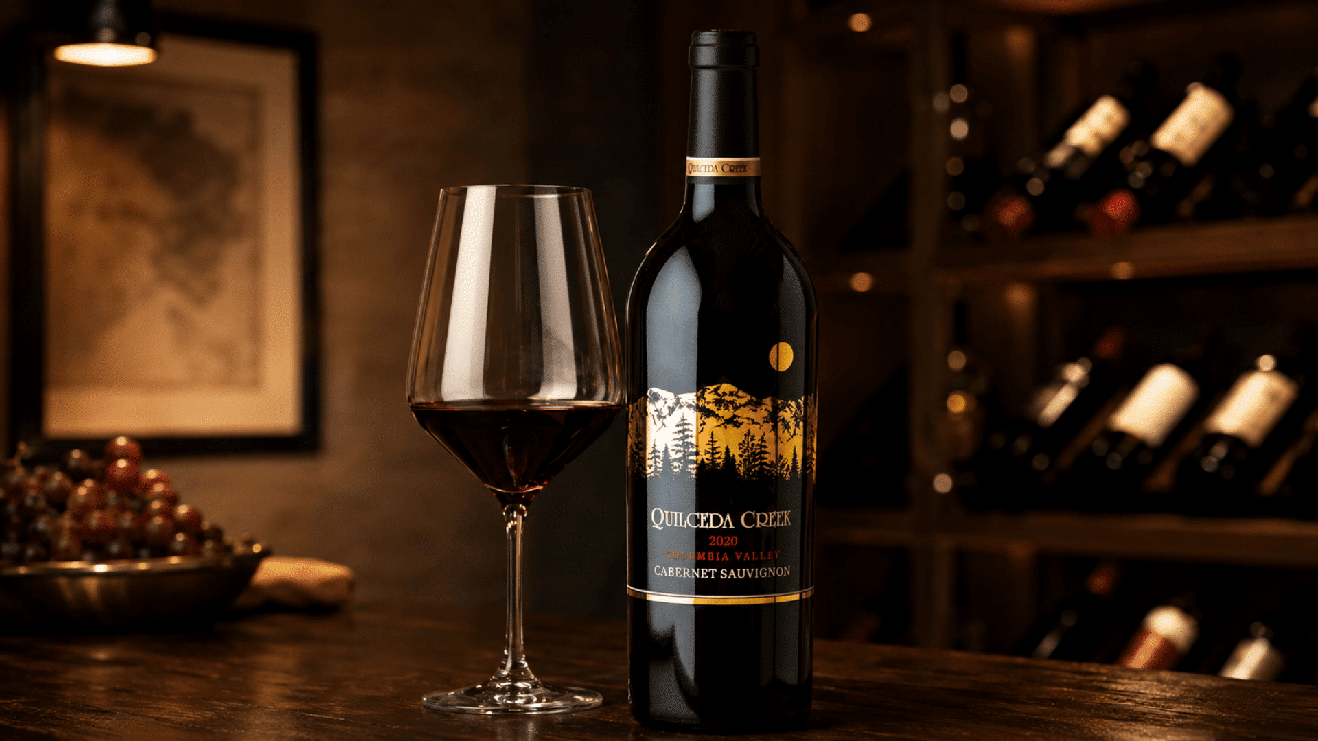 cabernet sauvignon bottle beside a red wine glass in a warm, wood-lined wine room