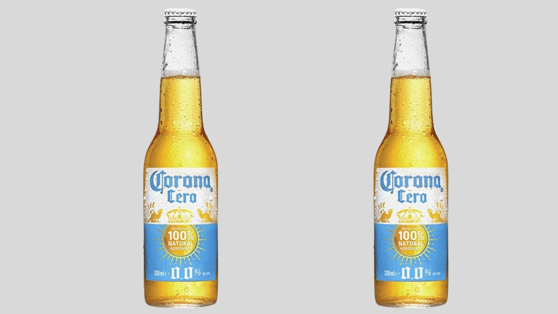 Corona Cero non-alcoholic beer bottles displayed side by side on a plain background with chilled appearance