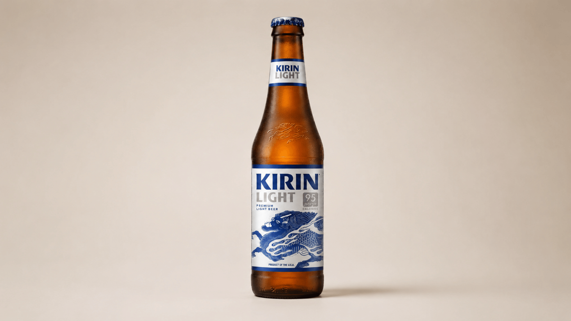 kirin light beer bottle with blue label on plain background.