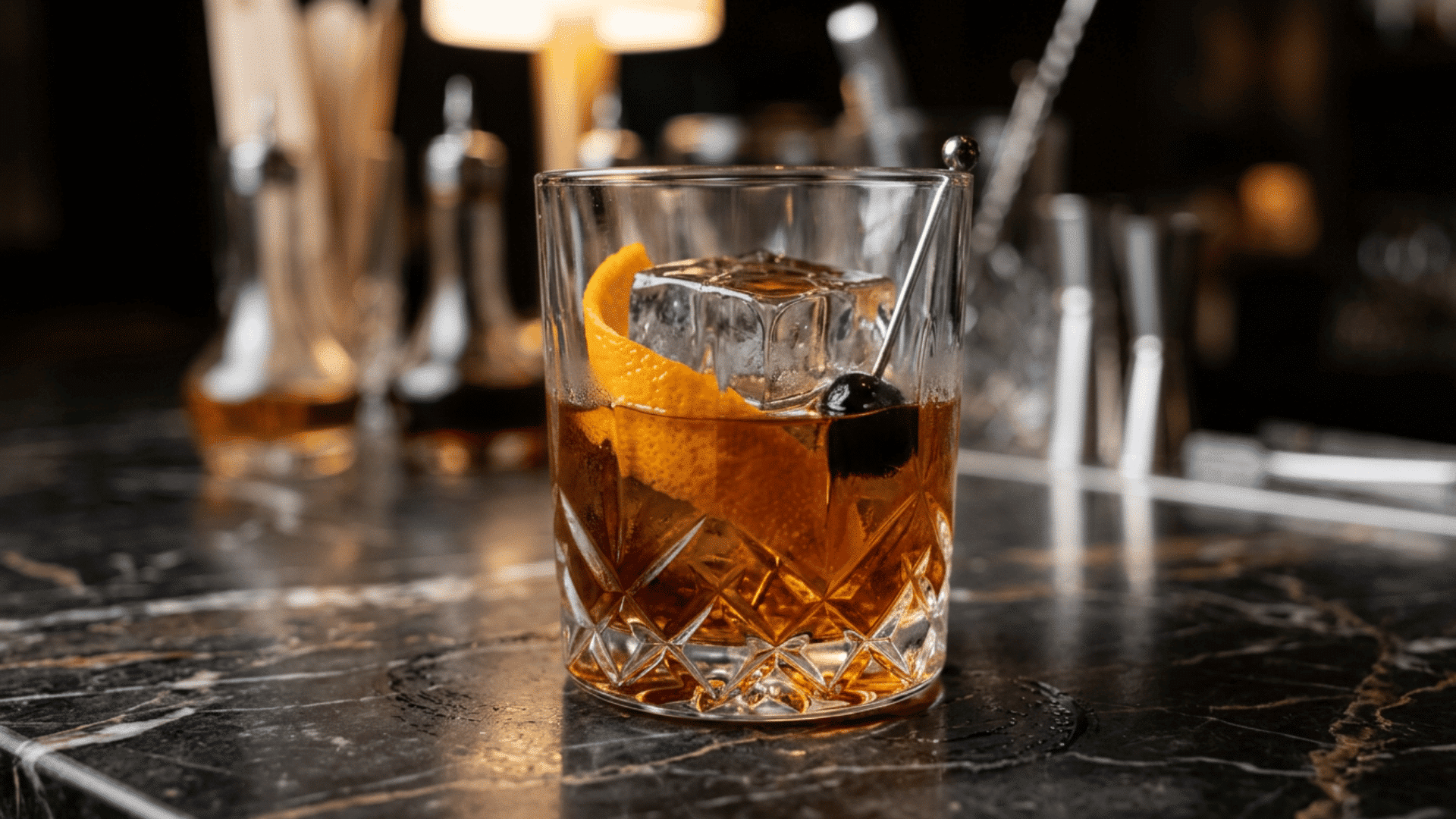 Old Fashioned with orange peel over ice