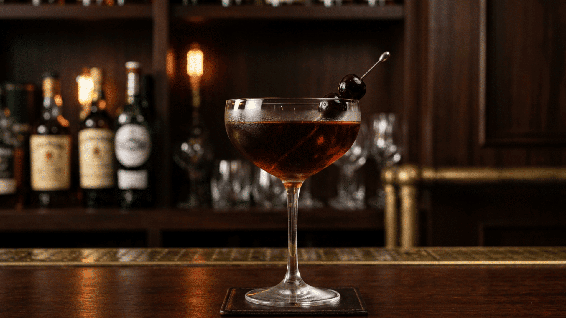 Rob Roy cocktail with cherry in coupe