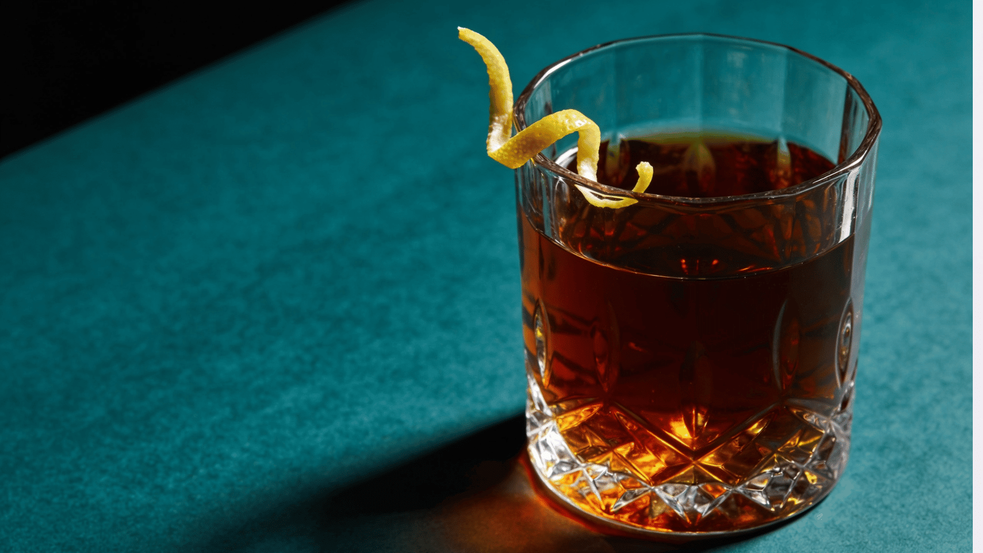 Sazerac with lemon peel in rocks glass