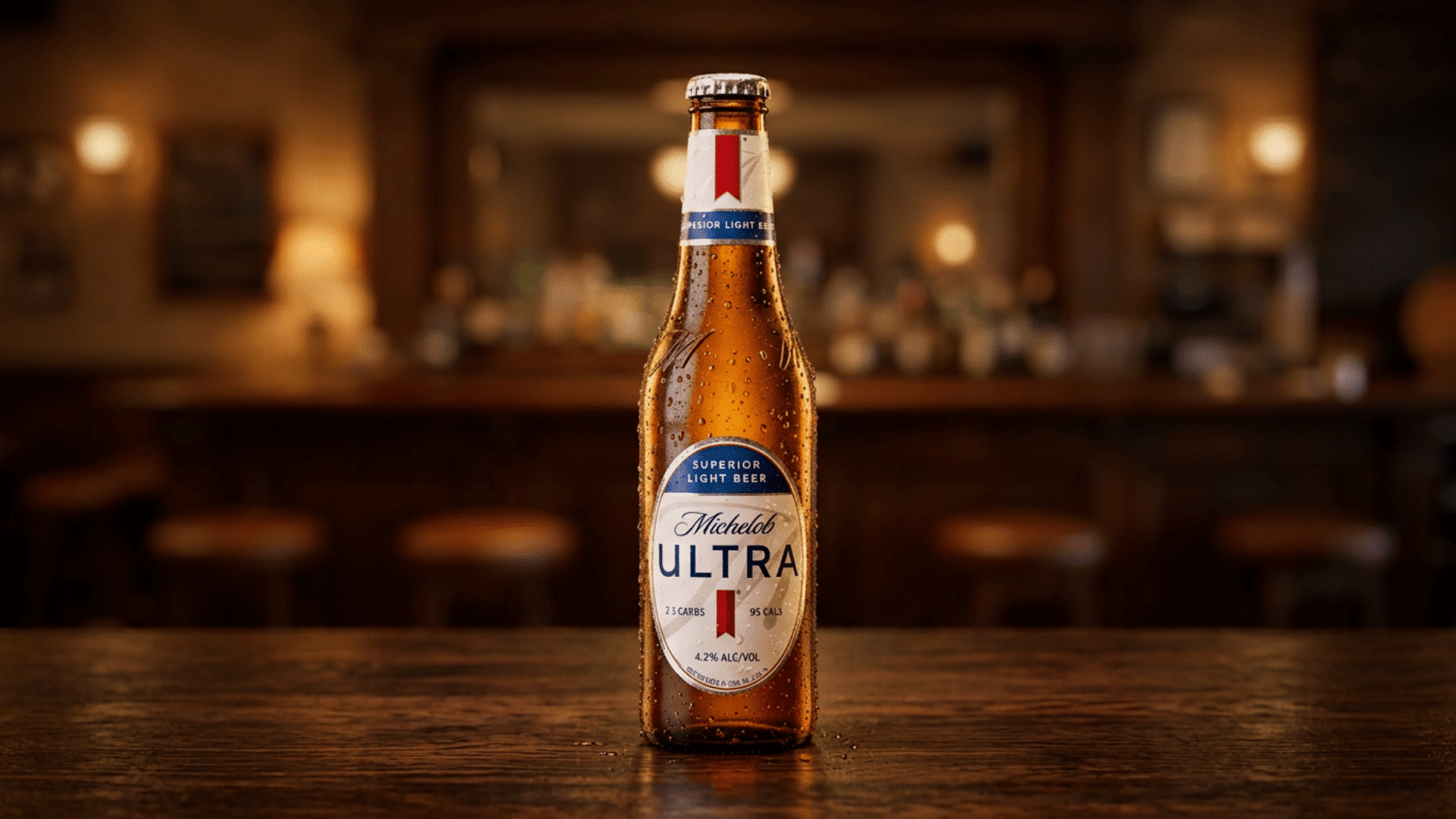 chilled michelob ultra bottle on a wooden bar counter